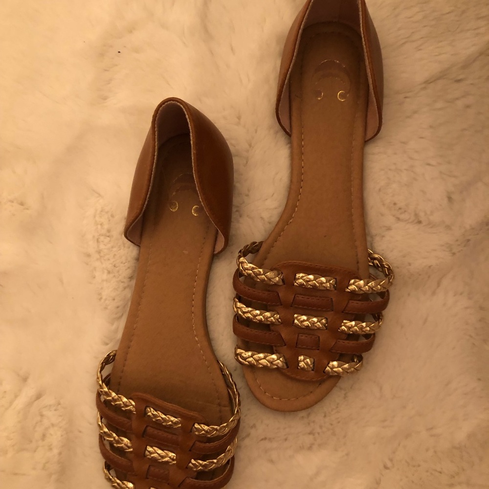 Charming Charlie’s brown slip on sandals